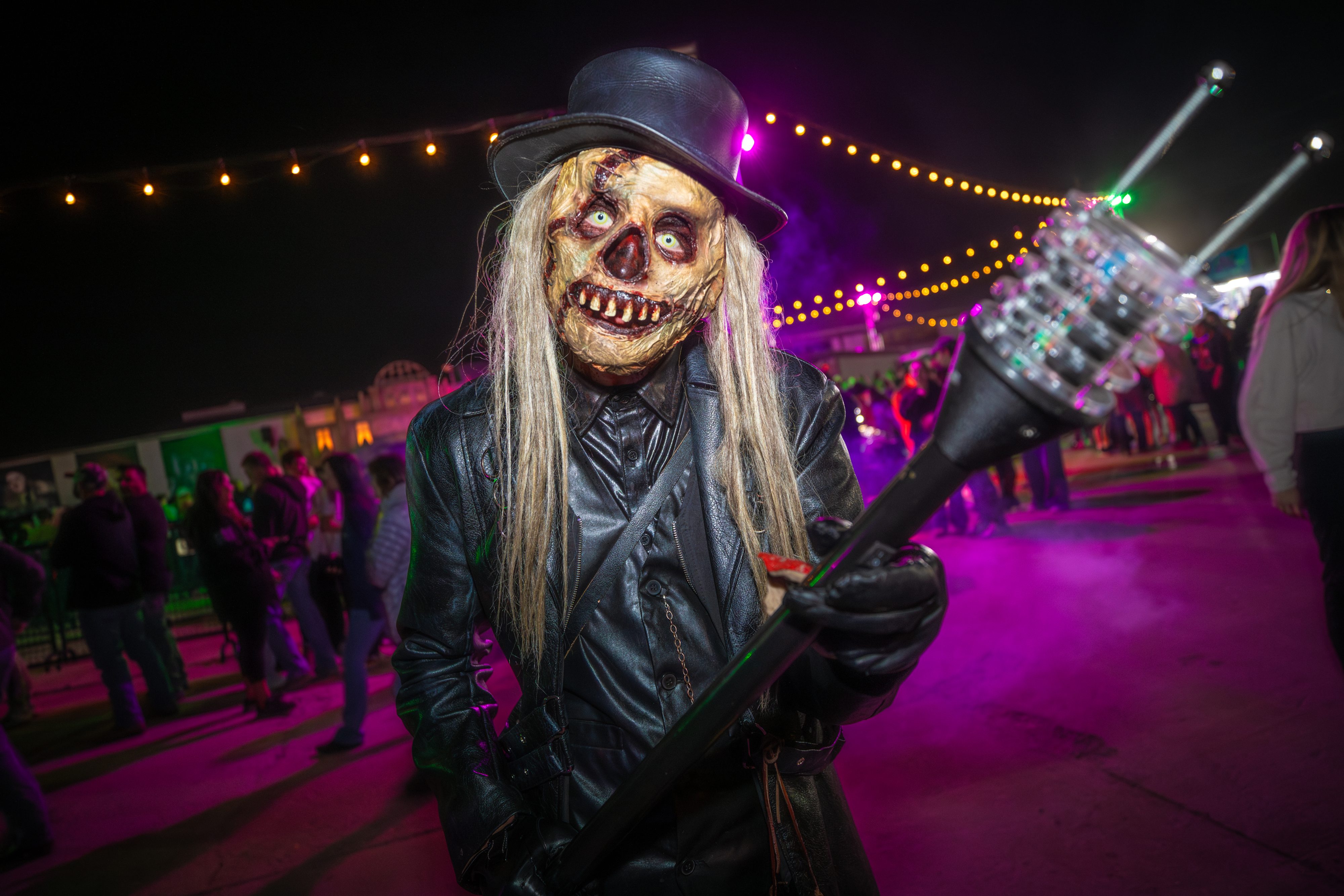 A person in a skull costume