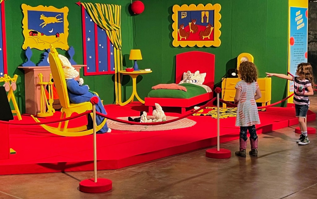 Kids looking at a set of Goodnight Moon