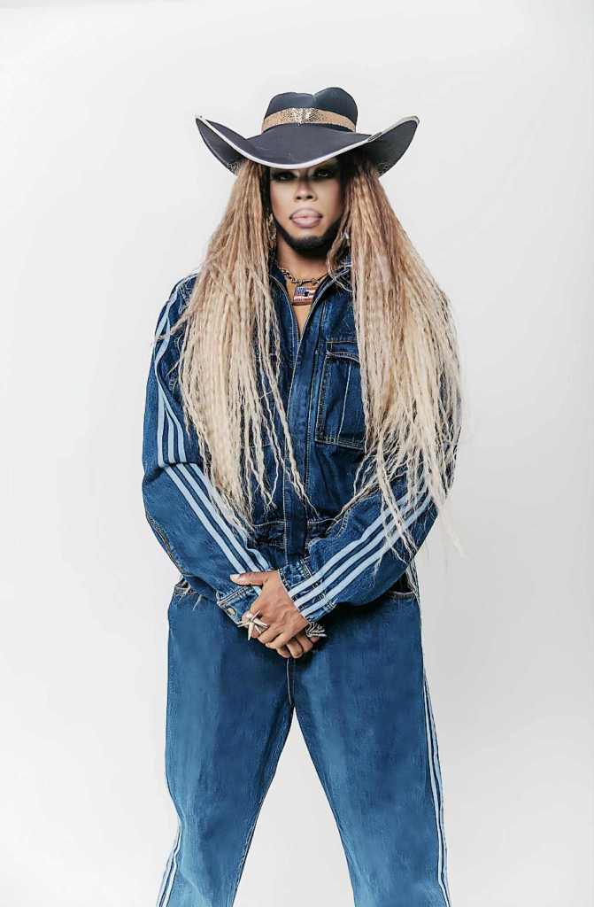 A drag queen in a denim outfit