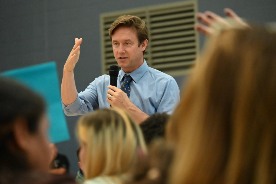 A man speaks to a crowd.