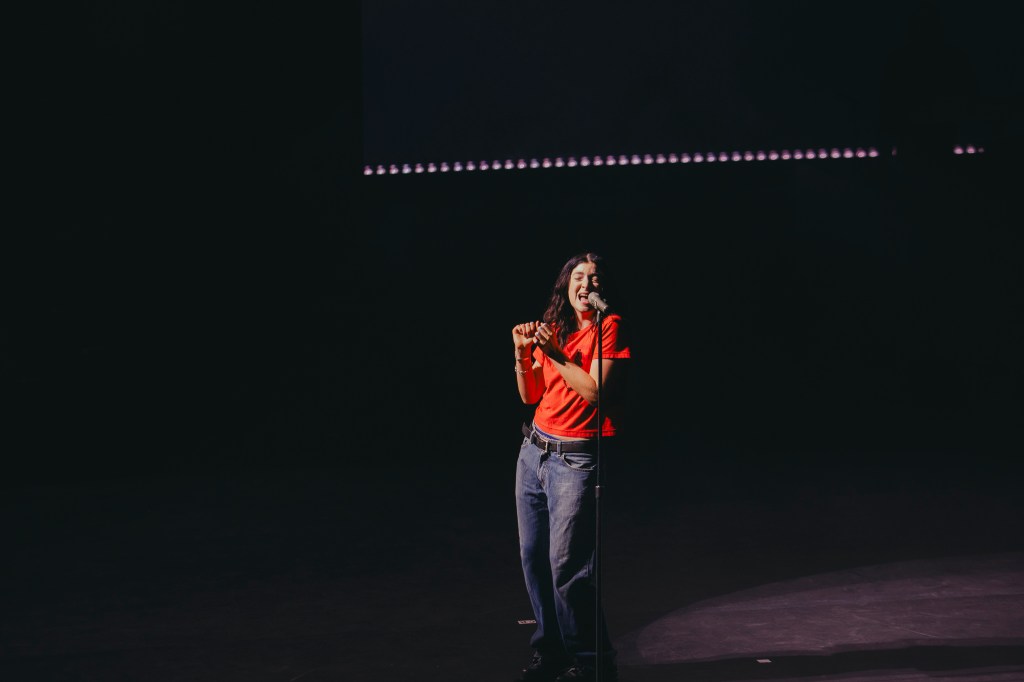 Lorde performing to the crowd at Red Rocks.