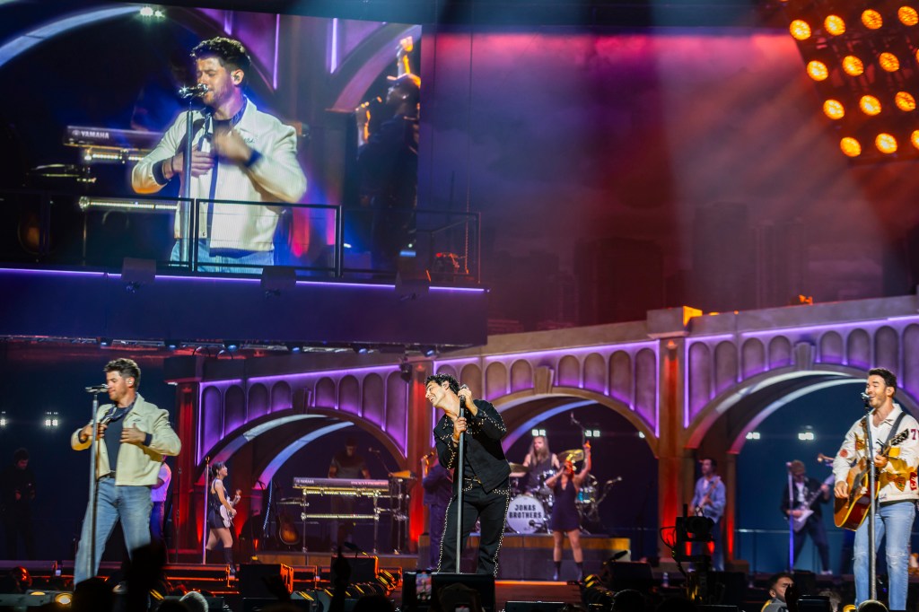 The Jonas Brothers on stage at Ball Arena in Denver, Colorado, for their JONAS20 Greetings From Your Hometown tour.