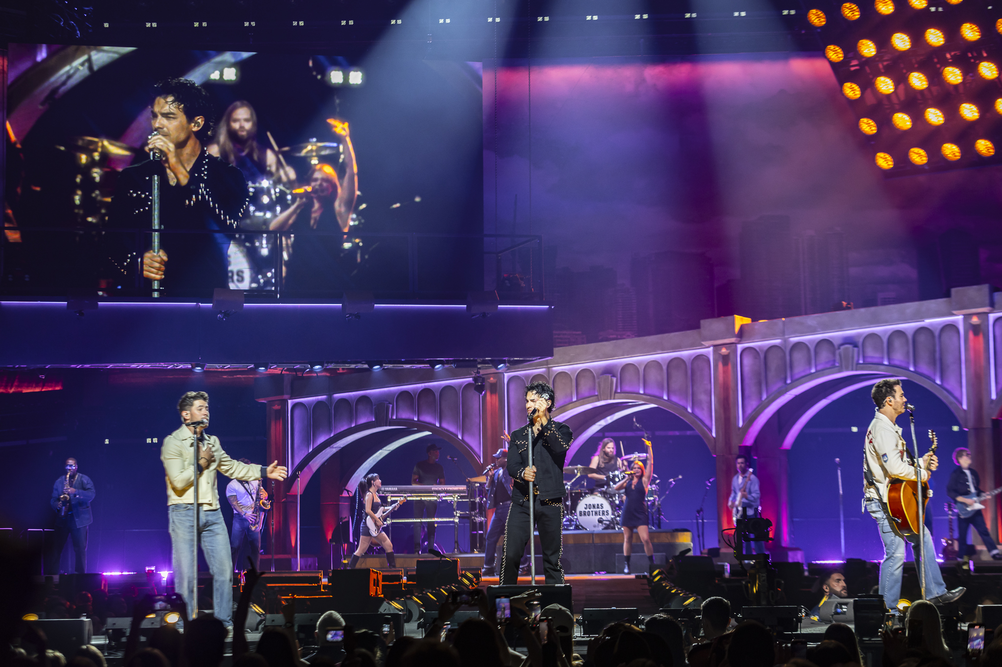 The Jonas Brothers on stage at Ball Arena in Denver, Colorado, for their JONAS20 Greetings From Your Hometown tour.