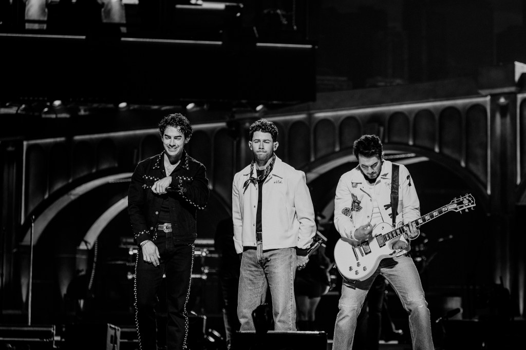 The Jonas Brothers on stage at Ball Arena in Denver, Colorado, for their JONAS20 Greetings From Your Hometown tour.