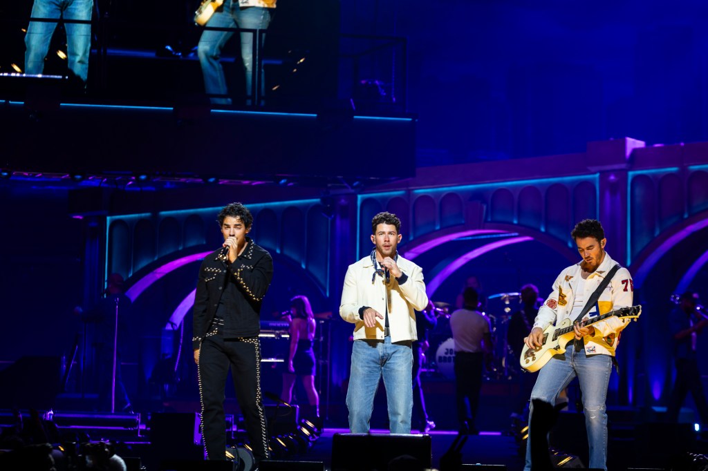 The Jonas Brothers on stage at Ball Arena in Denver, Colorado, for their JONAS20 Greetings From Your Hometown tour.