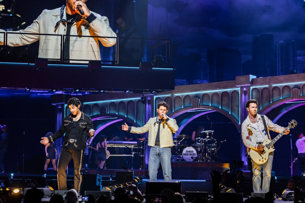 The Jonas Brothers on stage at Ball Arena in Denver, Colorado, for their JONAS20 Greetings From Your Hometown tour.