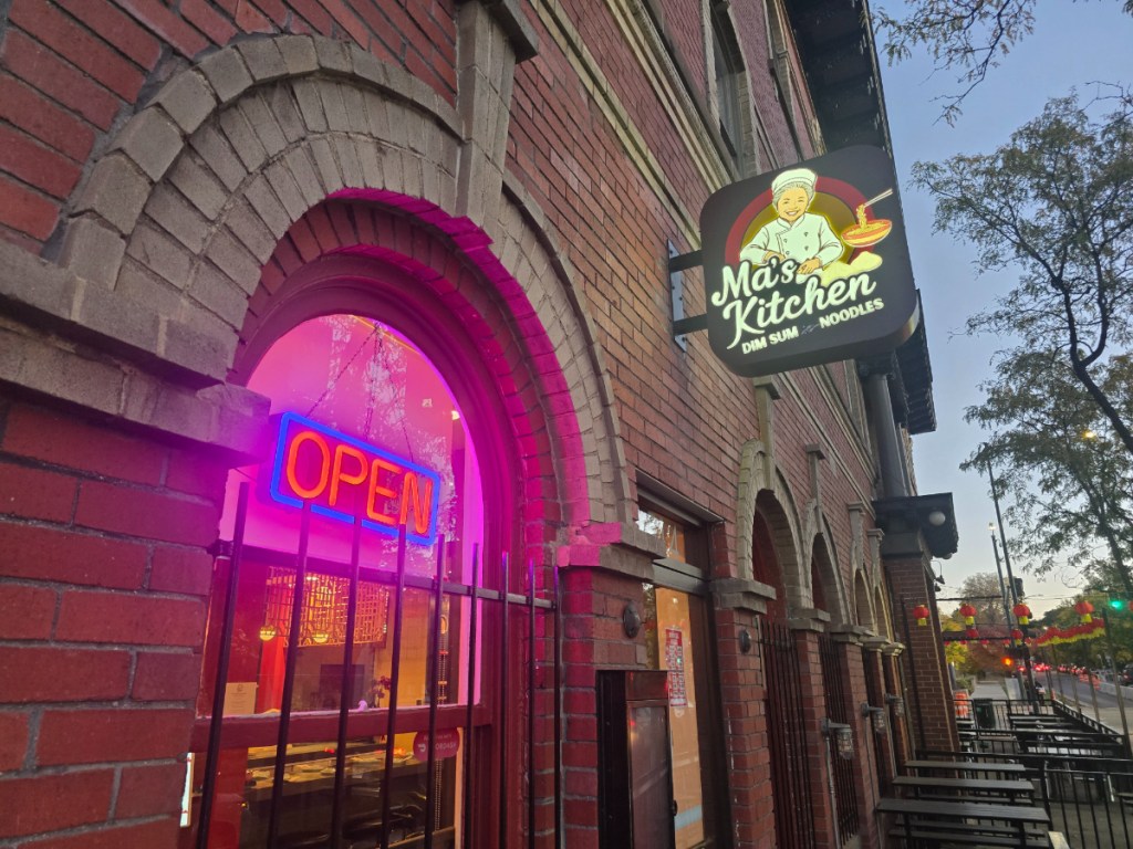 ma's kitchen sign on a building