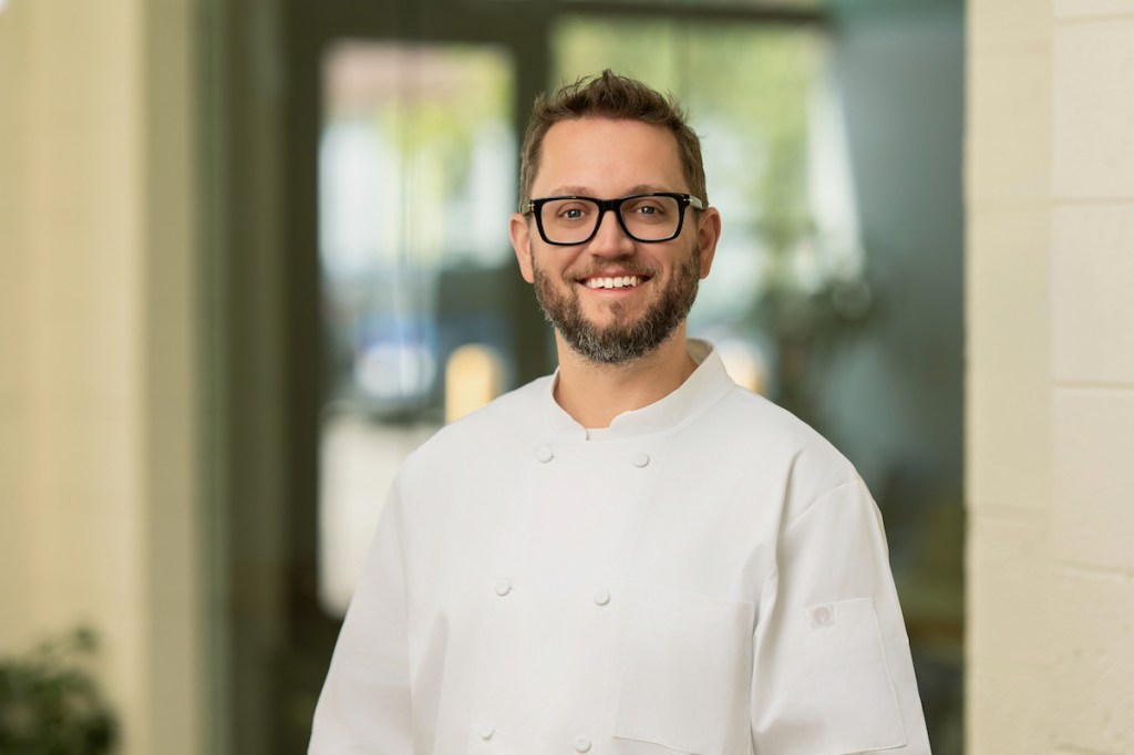 headshot of man in chef's coat