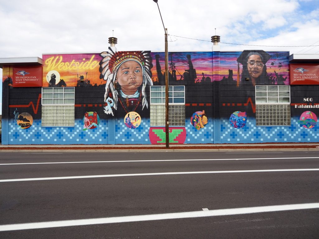A mural with native american imagery