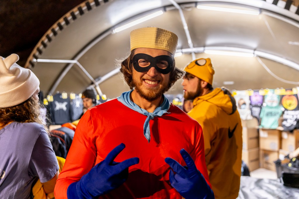 A photo showing a concertgoer dressed as Barnacle Boy from the popular tv show, Spongebob Squarepants.