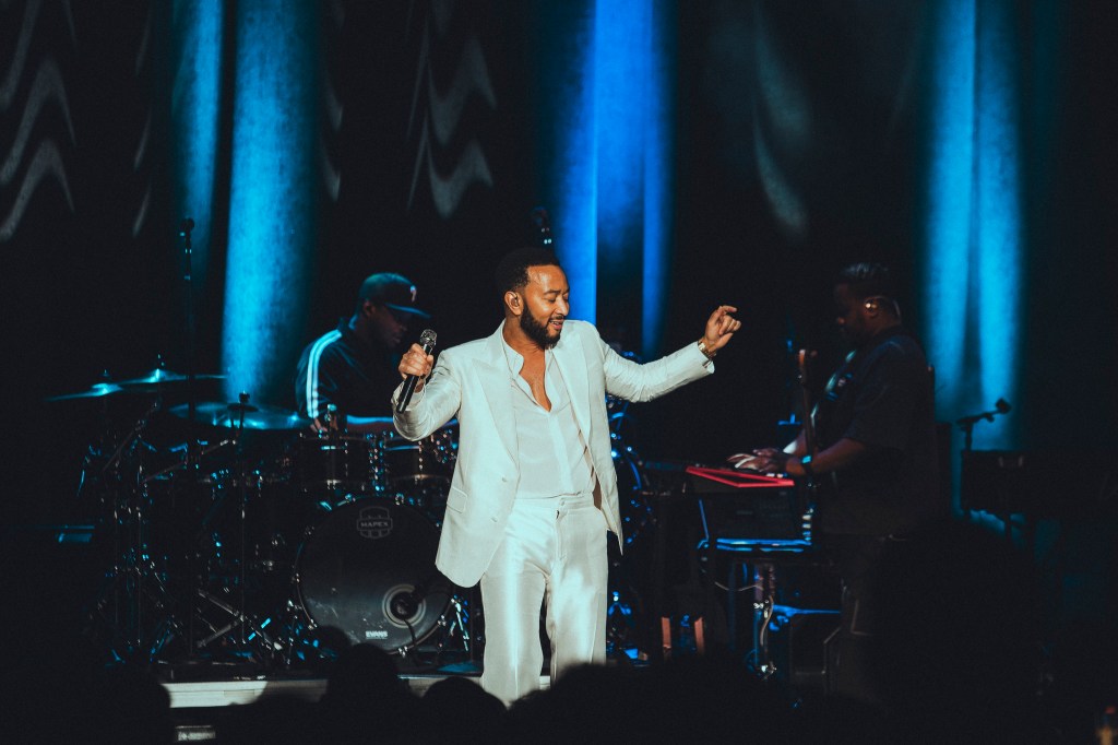 John Legend performing on stage at the Paramount Theatre on Wednesday, November 19.
