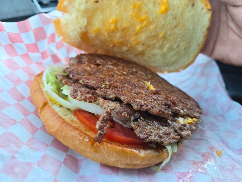 top bun pulled off a burger