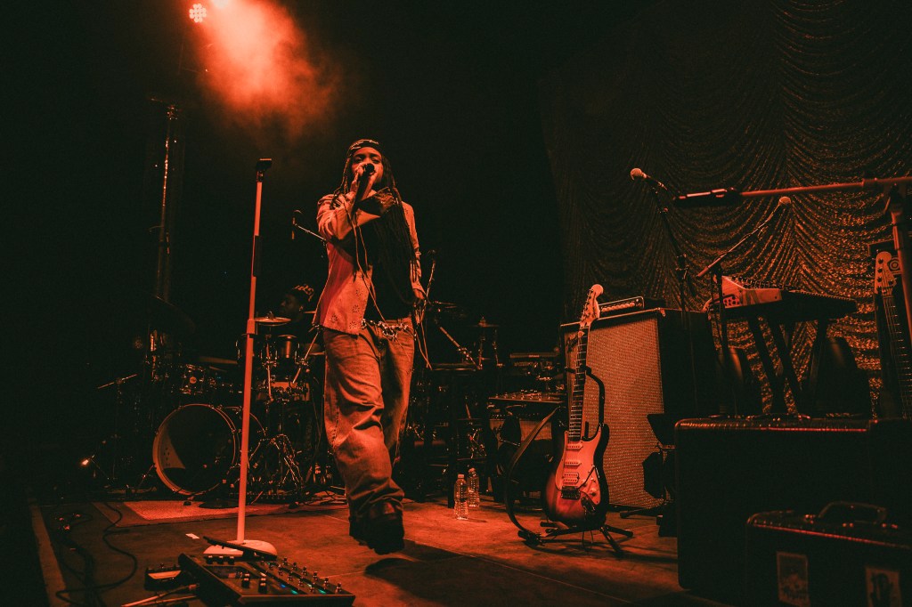 Ambré on stage at the Summit Music Hall in Denver, Colorado.