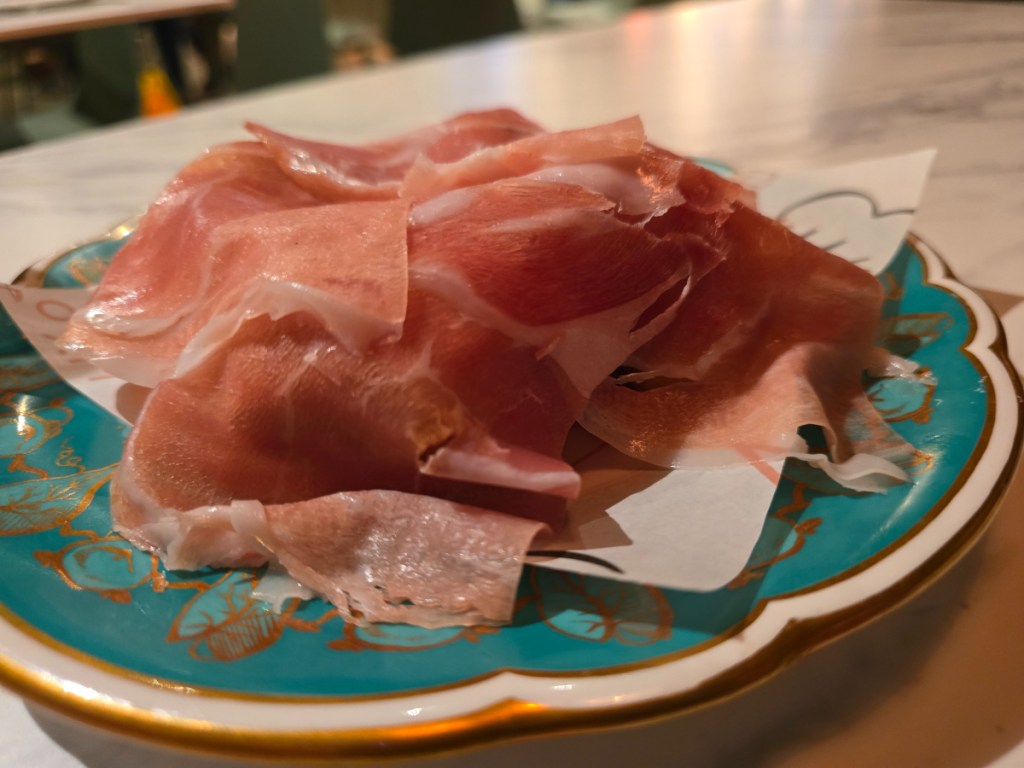 slices of prosciutto on a plate