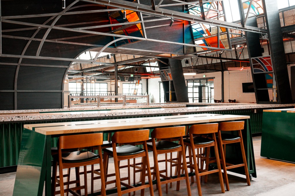 Indoor bar and long rectangular tables for large parties