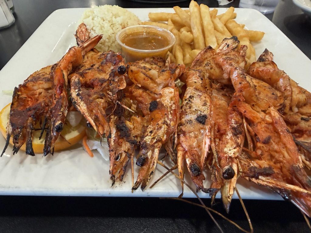 a plate of grilled shrimp