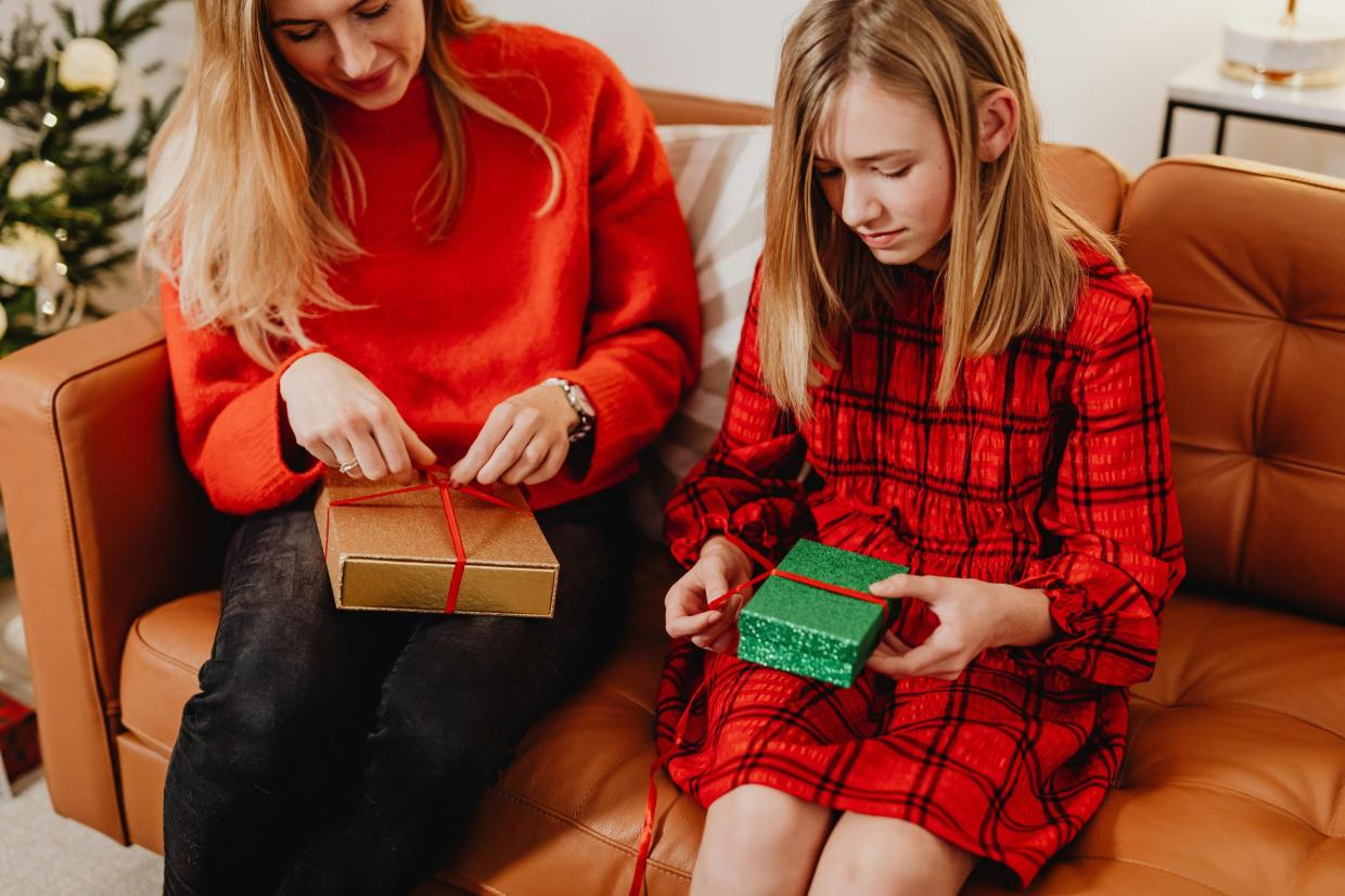 people opening gifts