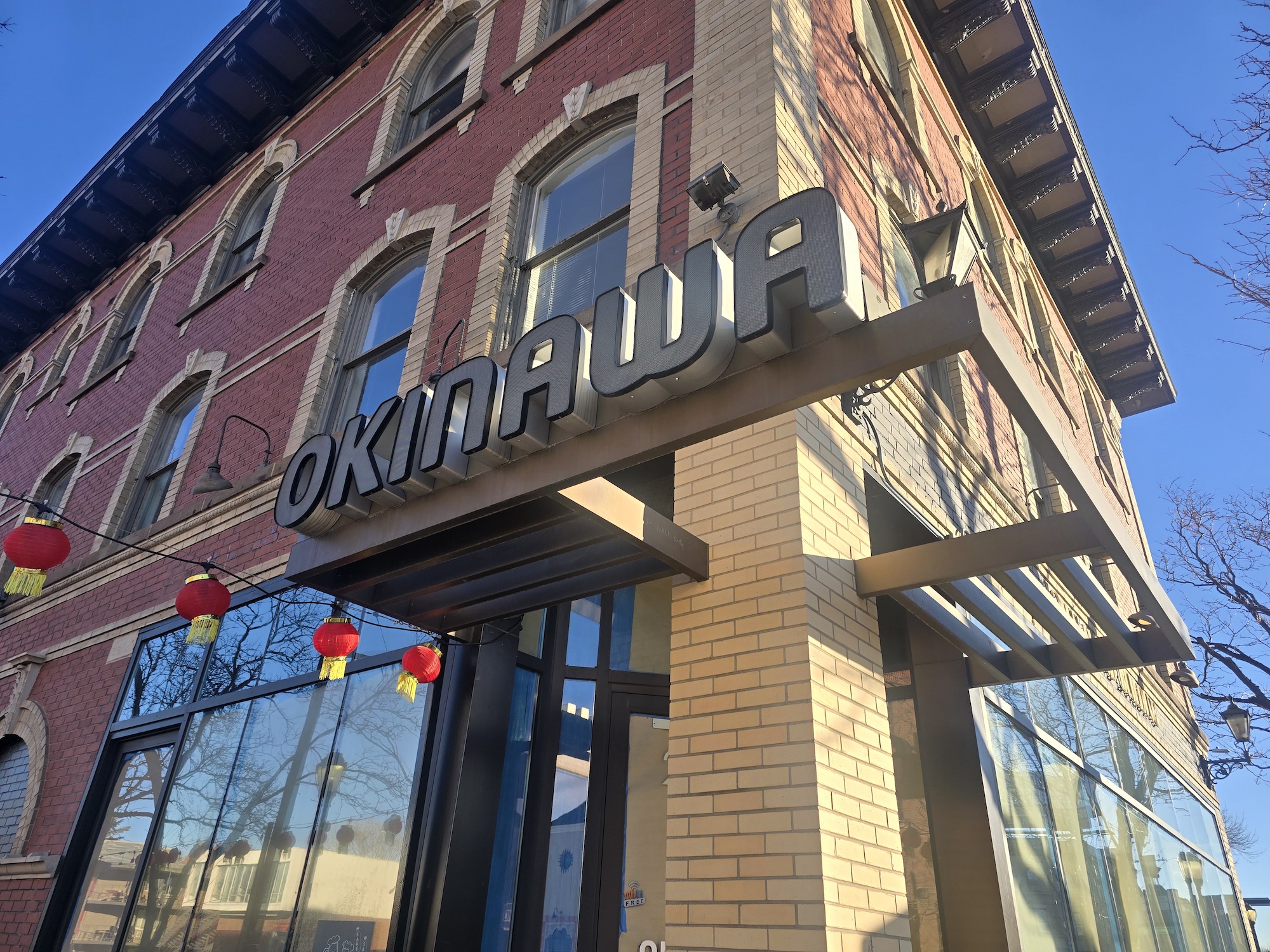 "Okinawa" sign on a building