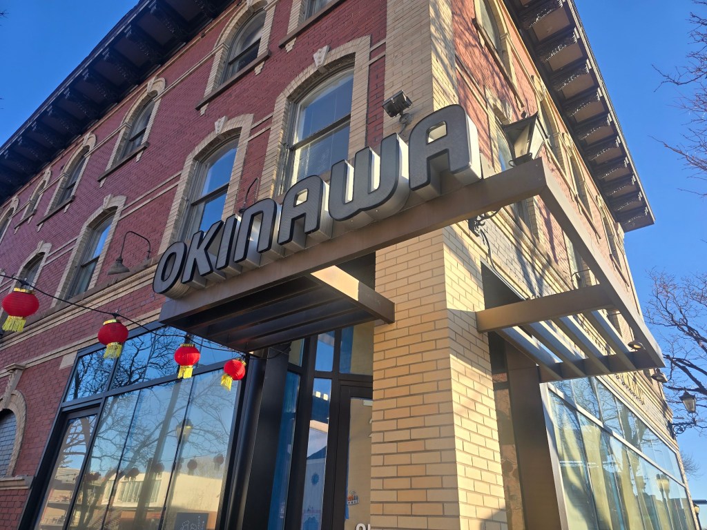 "Okinawa" sign on a building