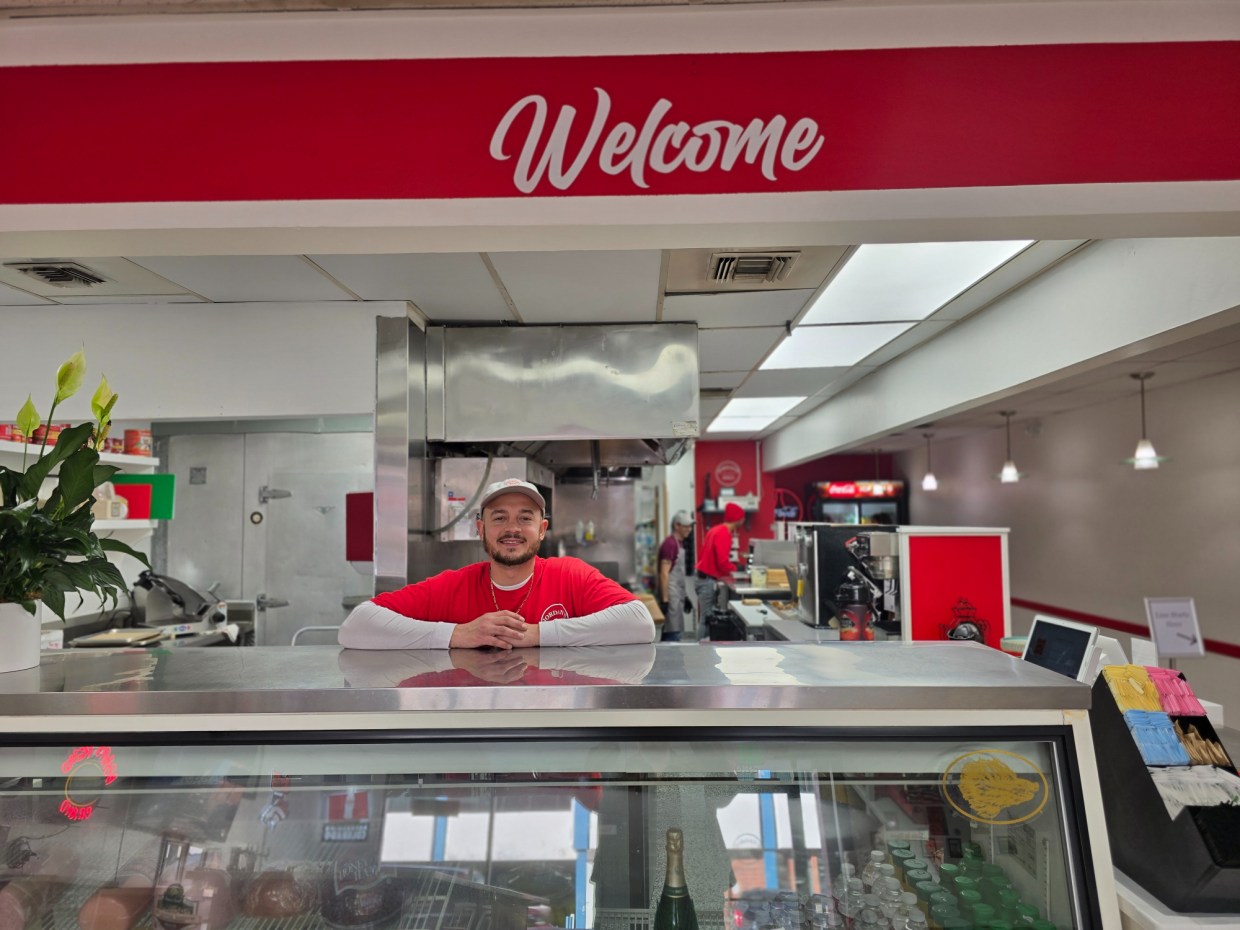 man behind deli counter