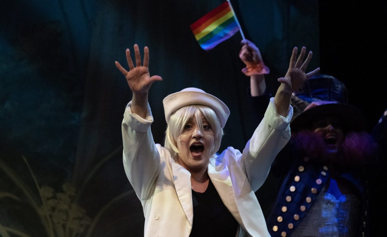 The ensemble of Shrek the Musical performs "Freak Flag" with Pride flags