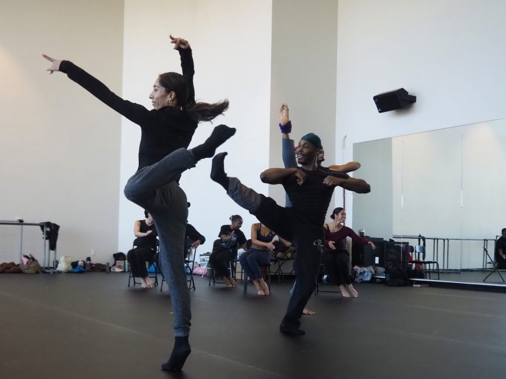 dancers kick and turn