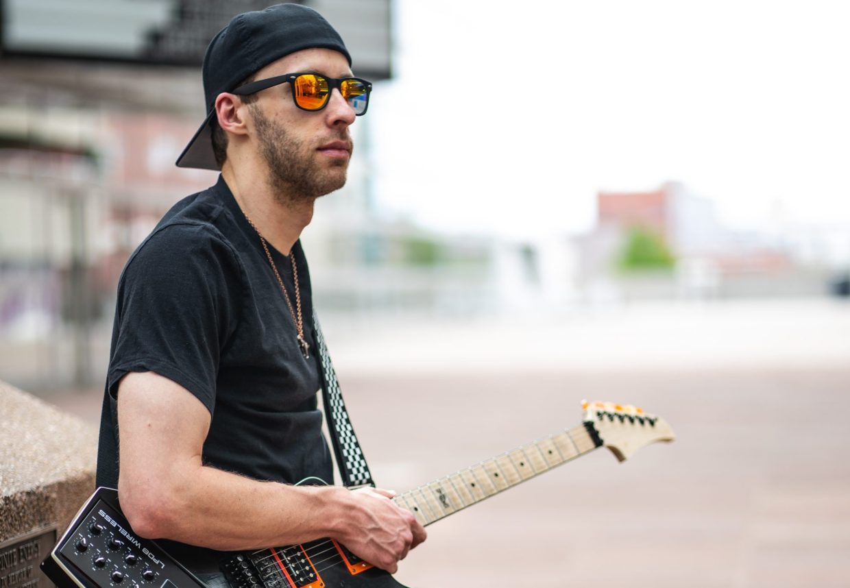 man holding a guitar
