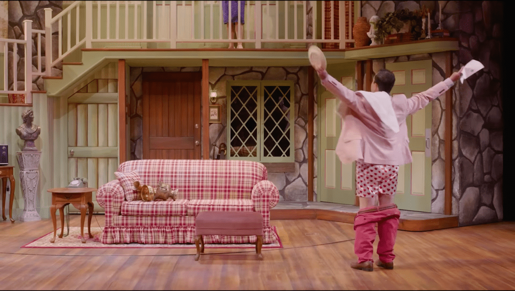 A man with his pants down in a theater production