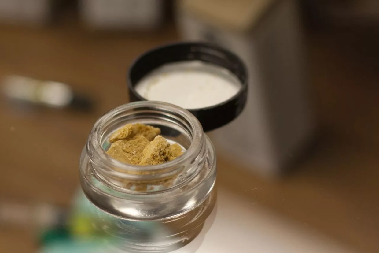 jar of cannabis thc wax on dispensary counter
