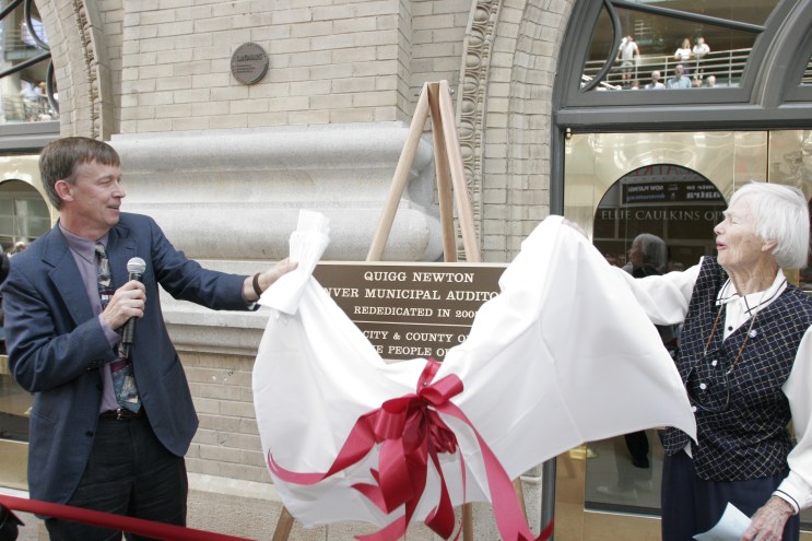 Two people outside a building that's about to debut to the public