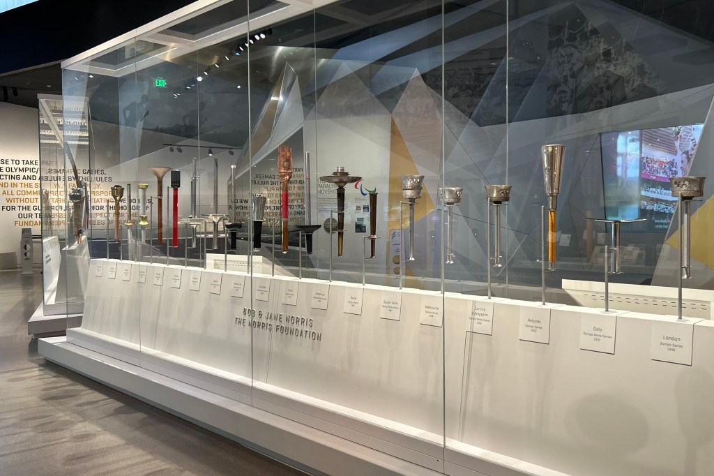 Torches displayed in glass cases at the US Olympic and Paralympic Museum