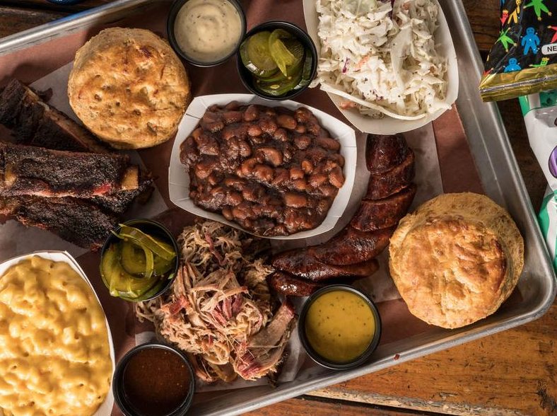 tray of barbecue meat and sides