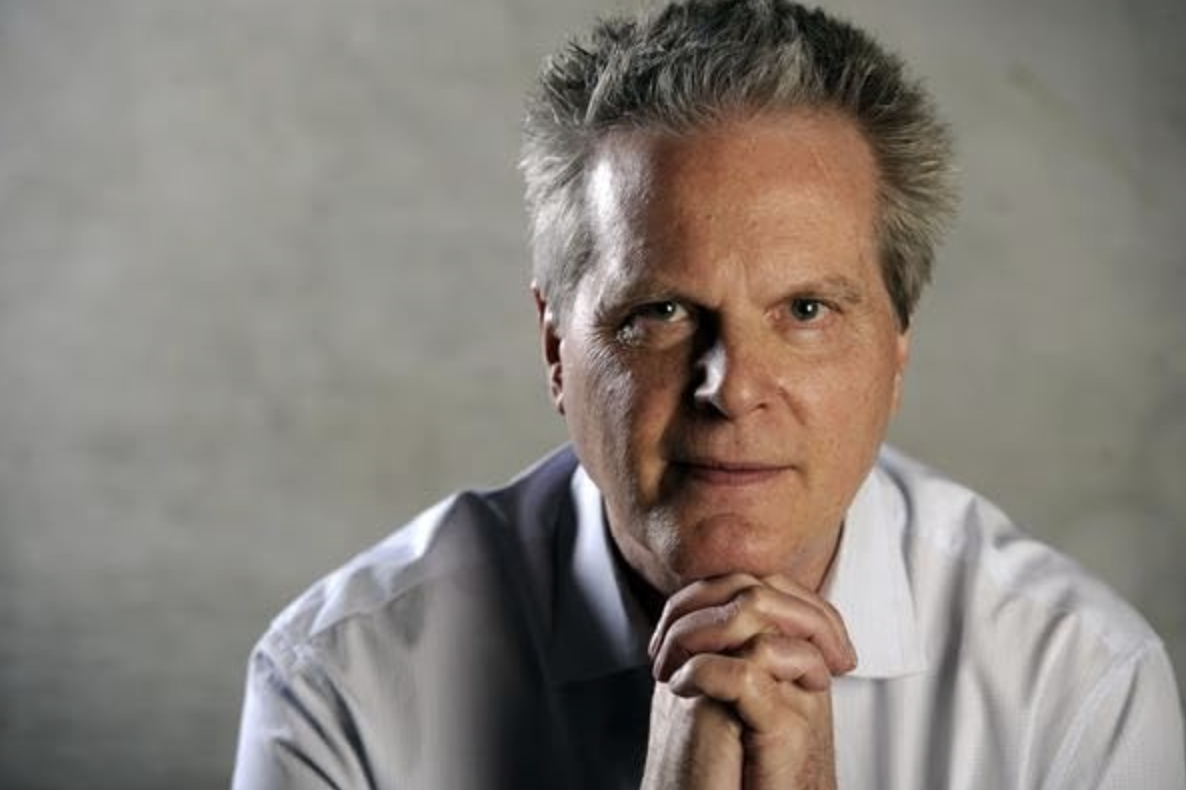 A portrait of former Colorado Film Commissioner Donald Zuckerman.