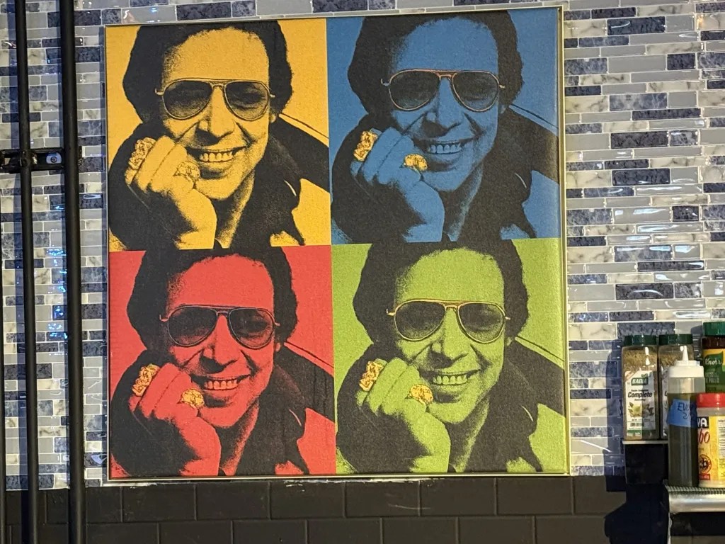 mural of hector lavoe at new Puerto Rican social club, Aguanile, in Denver