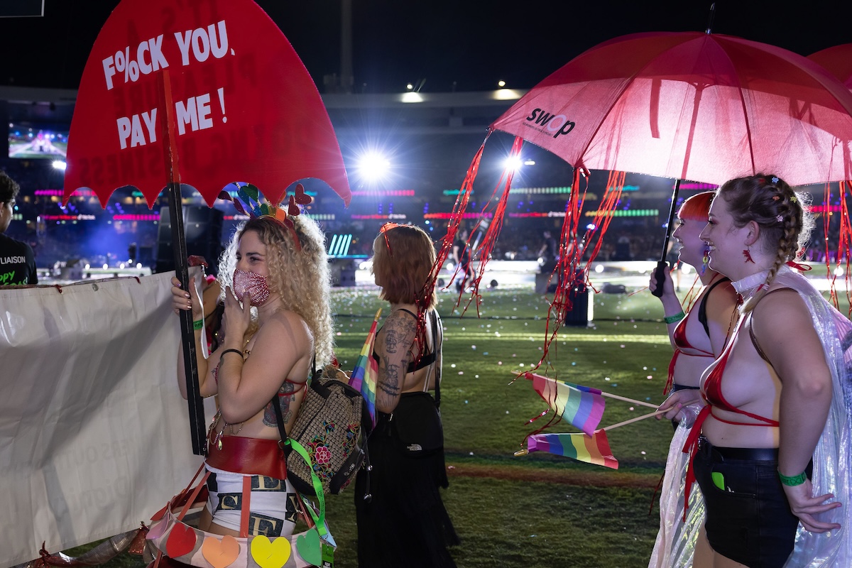sex workers march with signs
