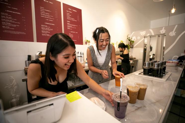 two women with coffee
