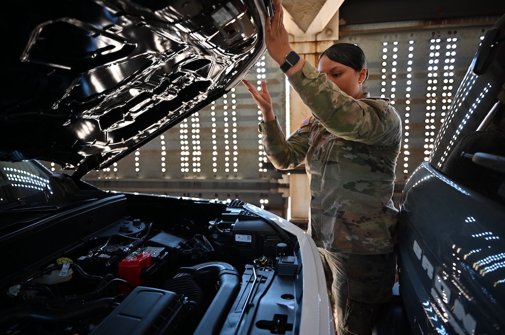 arizona national guard member works on a railcair