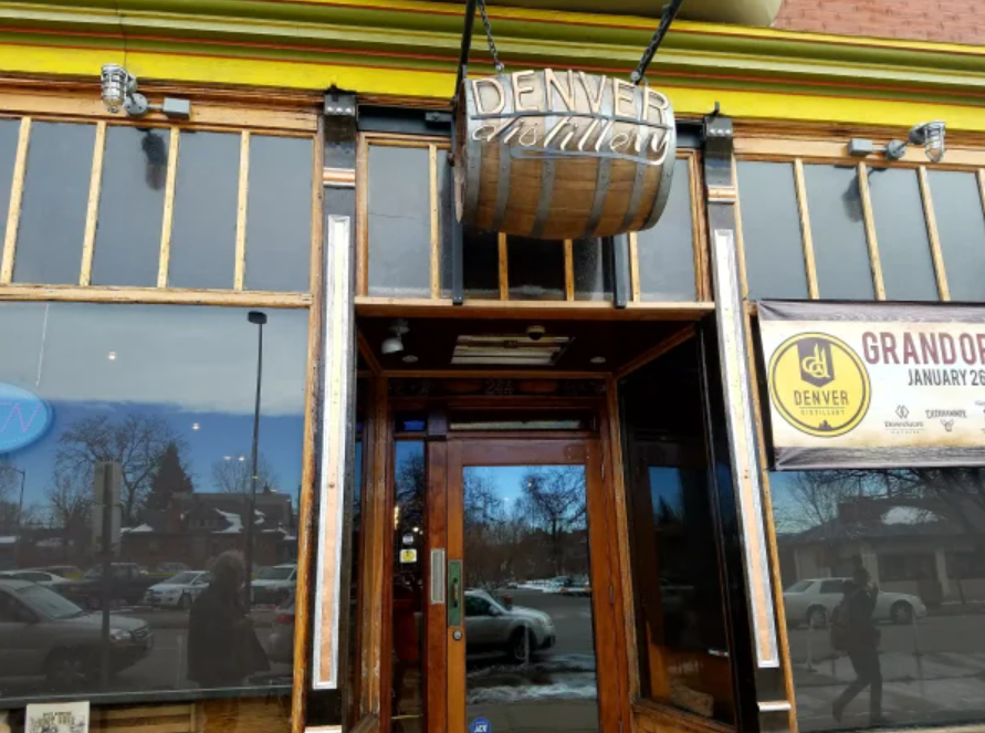 entryway under "Denver Distillery" sign