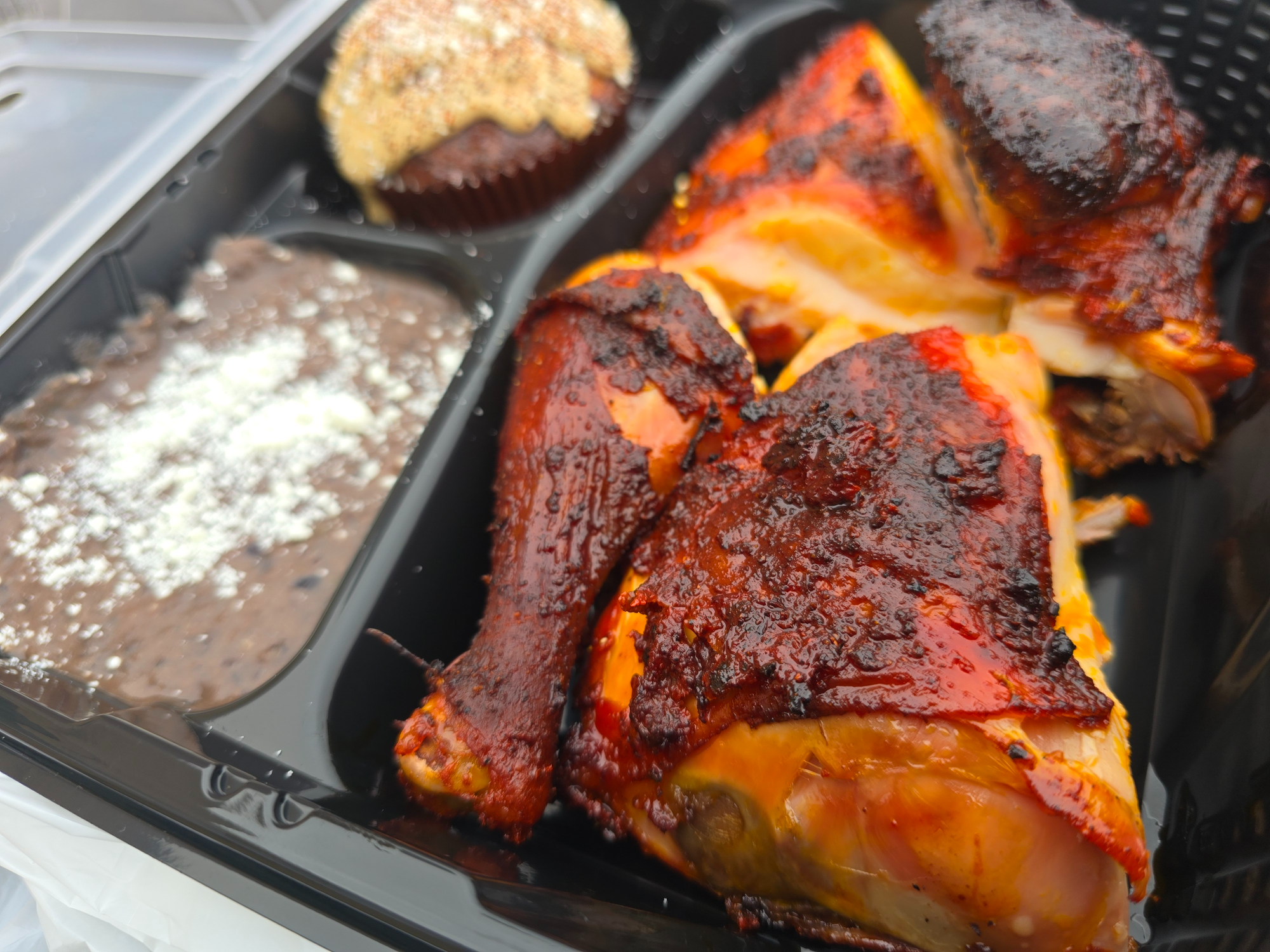 smoked chicken in a to-go box
