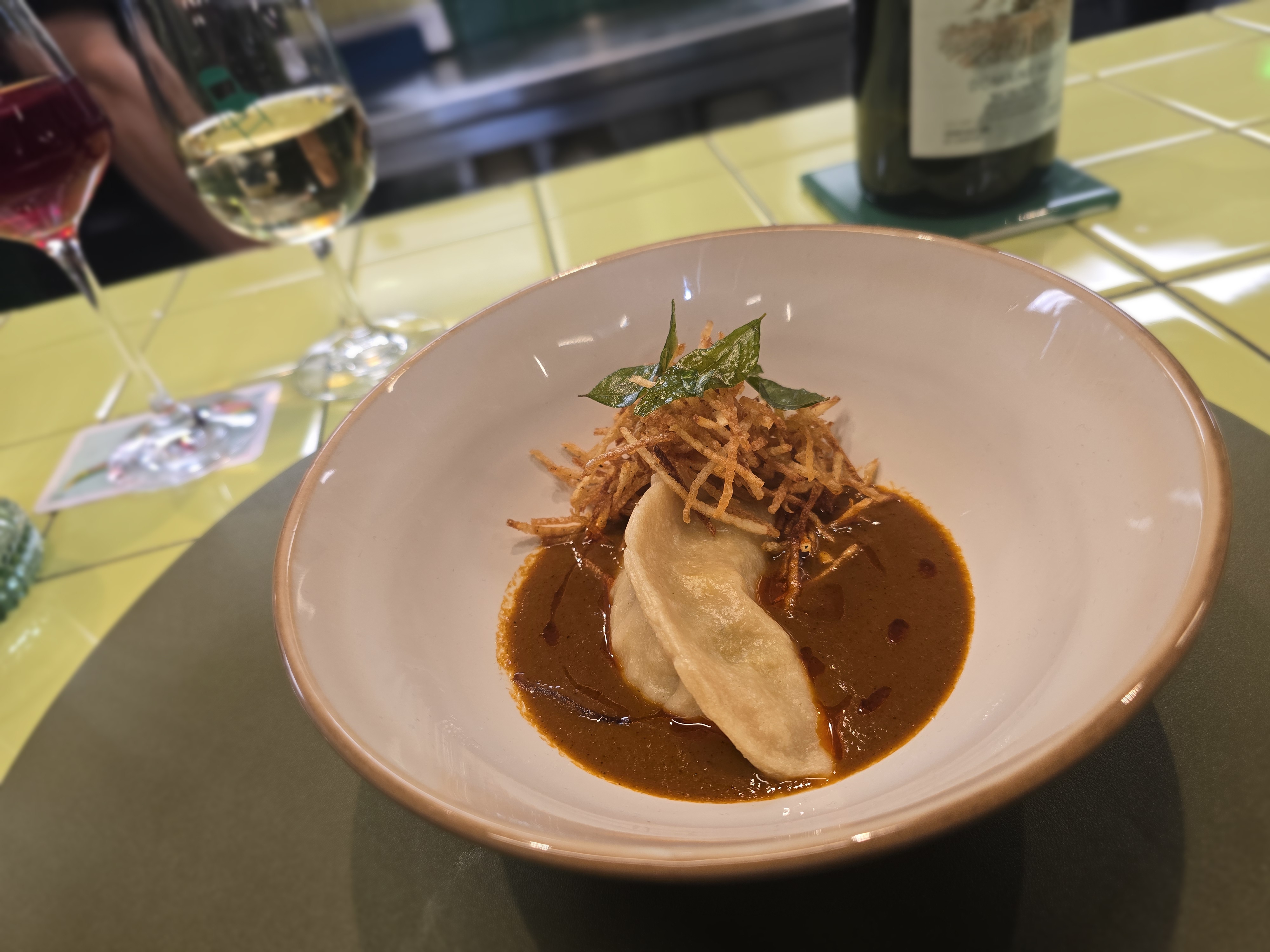 momo dumpling in sauce