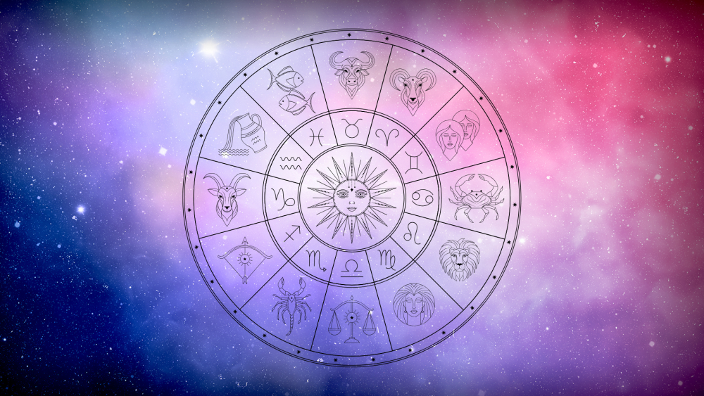 An astrological wheel over a cosmic background