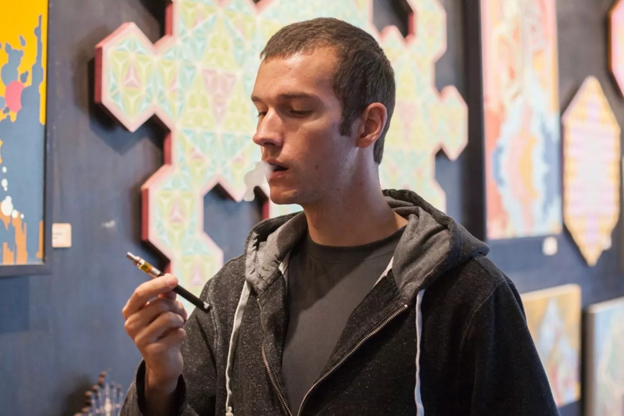 A man hits a THC vape pen