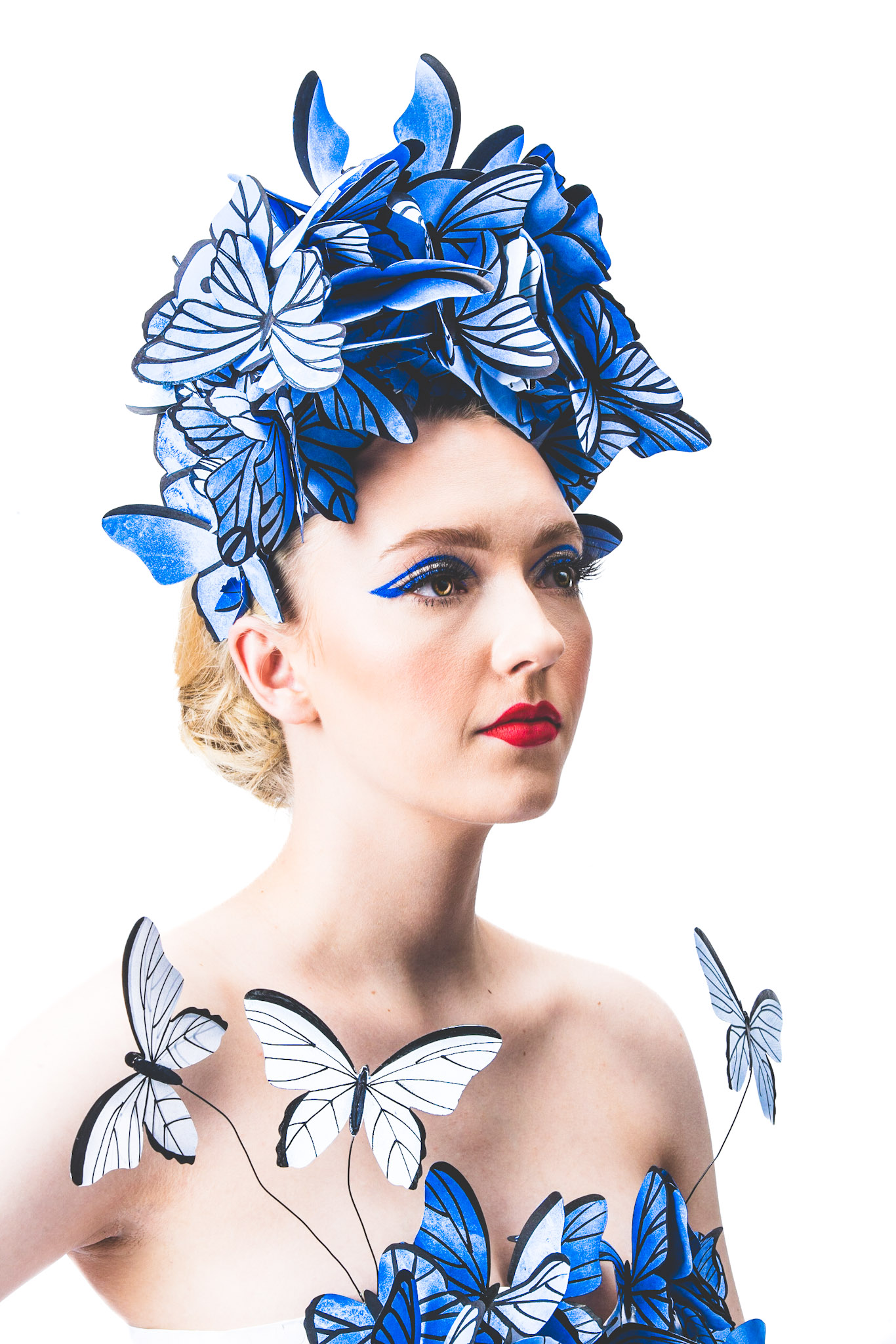 A model wearing a costume made of paper butterflies for the Paper Fashion Show