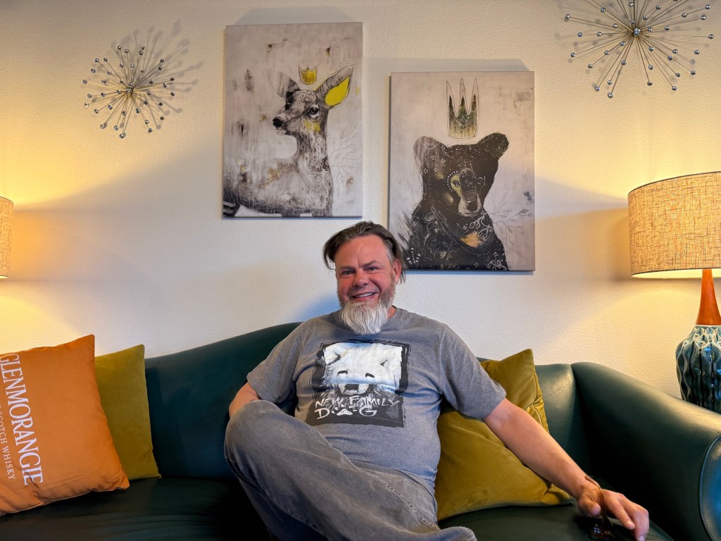 a man sitting on a couch