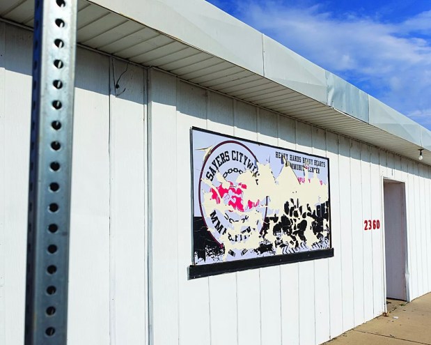 old gym sign on wall