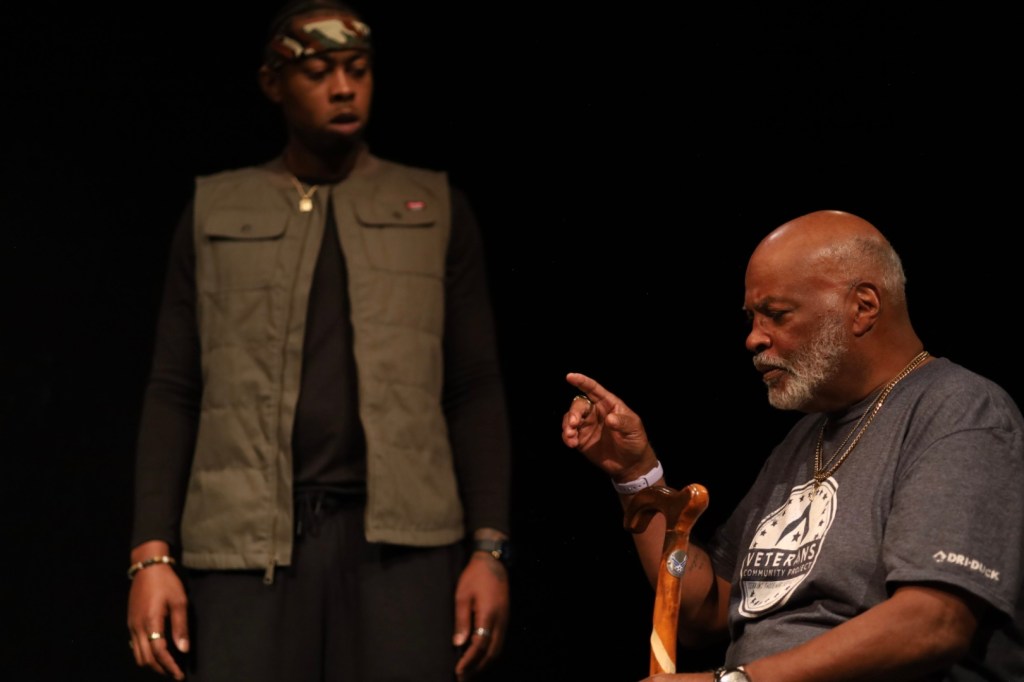 Two actors rehearse a scene