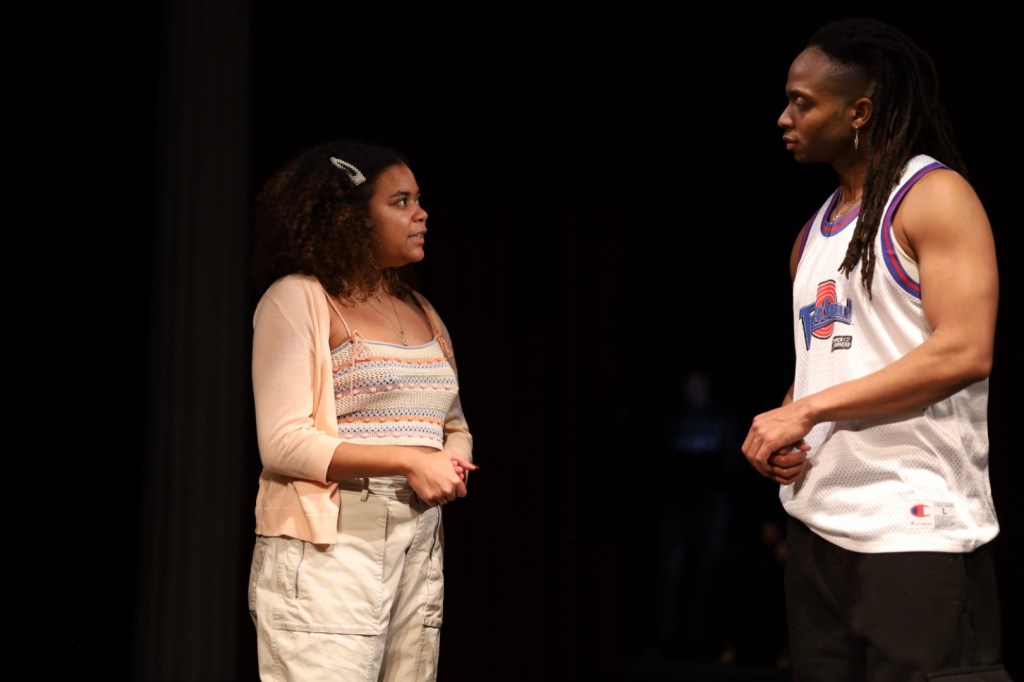 Two actors rehearse a scene
