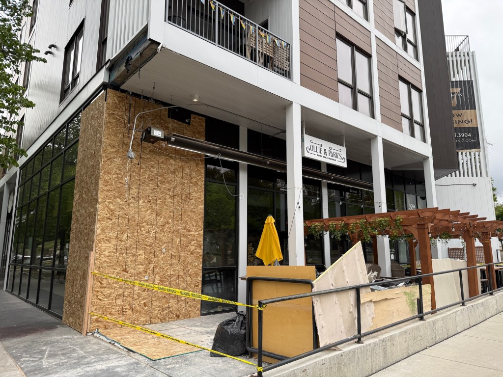 a boarded up restaurant