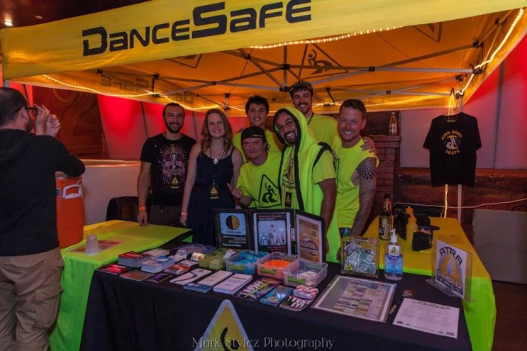 a booth for DanceSafe at a concert