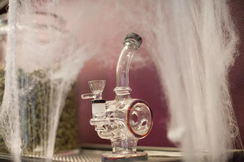 Bong surrounded by spider webs